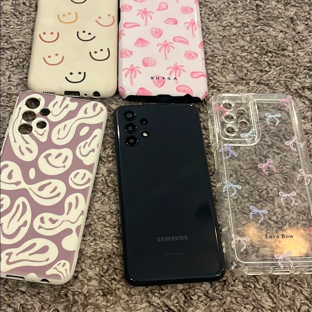 Samsung Black Smartphone with Assorted Cases